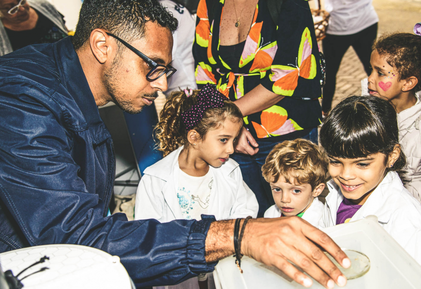WMP staff member Wesly, at a school education program