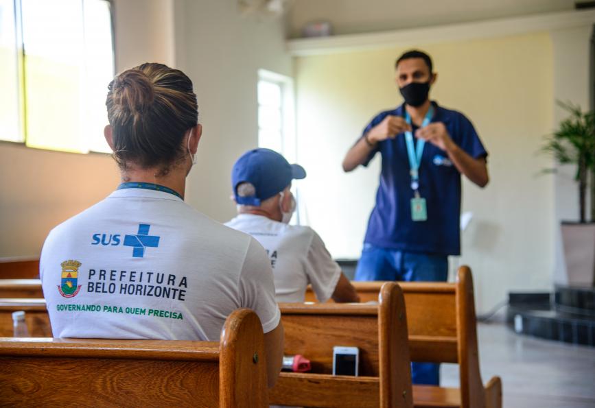 World Mosquito Program staff speaking to community members in Belo Horizonte, Brazil